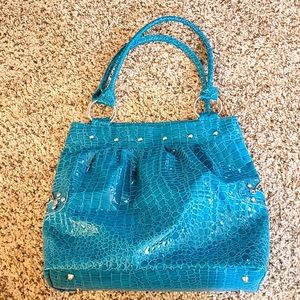 Teal colored large purse